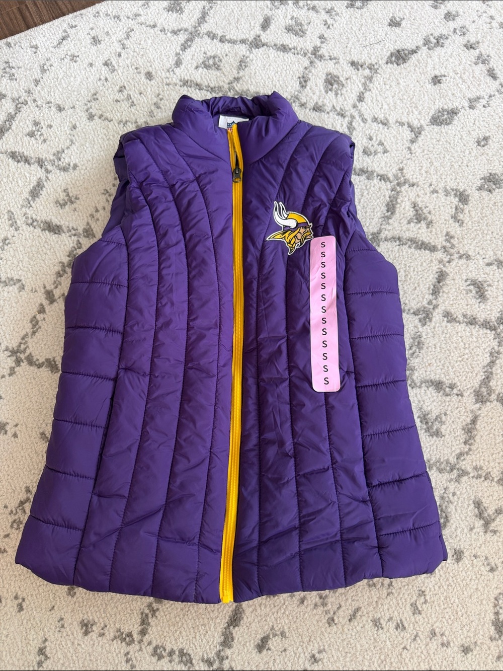 NFL Women’s Purple Puffer Vest with Yellow Zipper